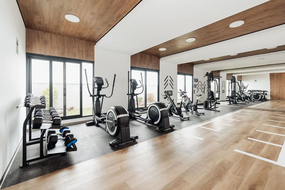 Beneficios de vivir en un edificio con gimnasio.